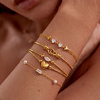 Gold Layered Dainty Bracelet – Heart, Sun, Knot & Pearl Zirconia - UMI