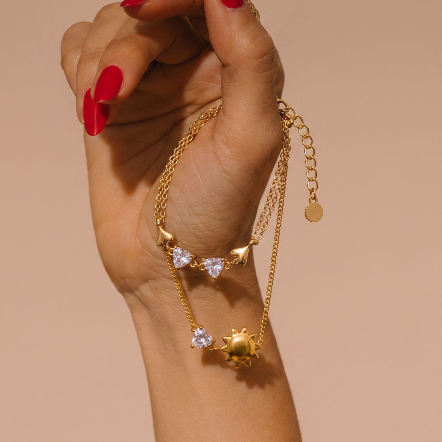 Gold Layered Dainty Bracelet – Heart, Sun, Knot & Pearl Zirconia