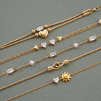 Gold Layered Dainty Bracelet – Heart, Sun, Knot & Pearl Zirconia - UMI