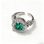 Emerald Green Moissanite Roman Fountain-Inspired Ring with Rotating Tassels & Iris Motif - UMI