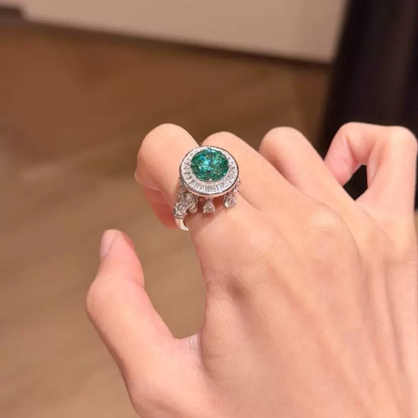 Emerald Green Moissanite Roman Fountain-Inspired Ring with Rotating Tassels & Iris Motif - UMI
