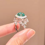 Emerald Green Moissanite Roman Fountain-Inspired Ring with Rotating Tassels & Iris Motif - UMI