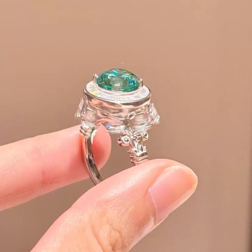 Emerald Green Moissanite Roman Fountain-Inspired Ring with Rotating Tassels & Iris Motif - UMI